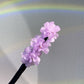 Pince à chignon fleurs clip rotatif coiffures faciles 2026