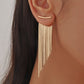 ✨ Boucles d’oreilles longues à pompons – Modèle asymétrique tendance