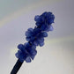 Pince à chignon fleurs clip rotatif coiffures faciles 2026