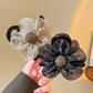 🌺2026 Nouvelle pince à cheveux élégante en tulle, motif tournesol – Design floral luxueux et volumineux