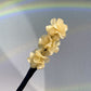 Pince à chignon fleurs clip rotatif coiffures faciles 2026