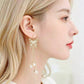 ✨ Boucles d’Oreilles Papillon Scintillantes en Cristal Œil-de-Chat à Pampilles