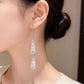 ✨ Élégantes boucles d’oreilles en forme de goutte – Le chic à la française, sublimé par des oxydes de zirconium étincelants ! 💎🤍
