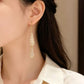 ✨ Élégantes boucles d’oreilles en forme de goutte – Le chic à la française, sublimé par des oxydes de zirconium étincelants ! 💎🤍