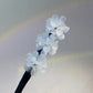 Pince à chignon fleurs clip rotatif coiffures faciles 2026