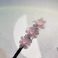 Pince à chignon fleurs clip rotatif coiffures faciles 2026