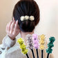Pince à chignon fleurs clip rotatif coiffures faciles 2026